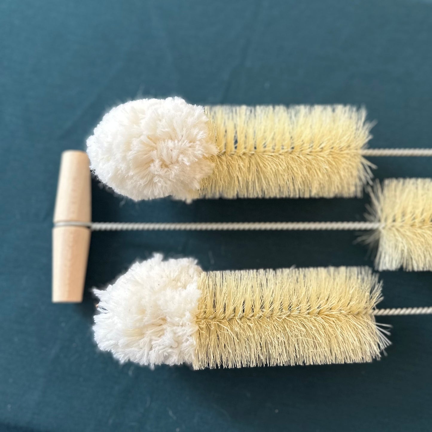 Cleaning brush with wooden grip