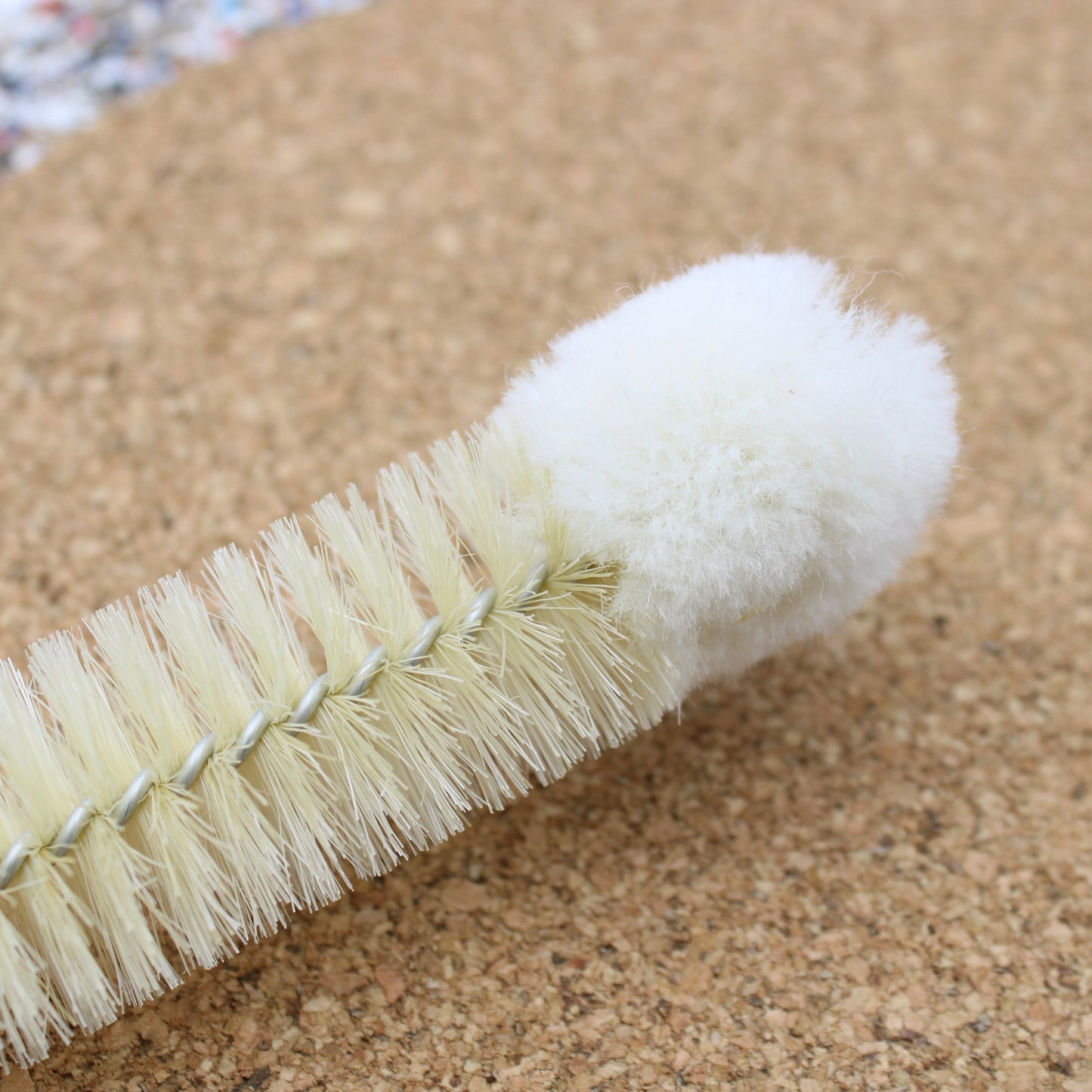 Cleaning brush with wool tip